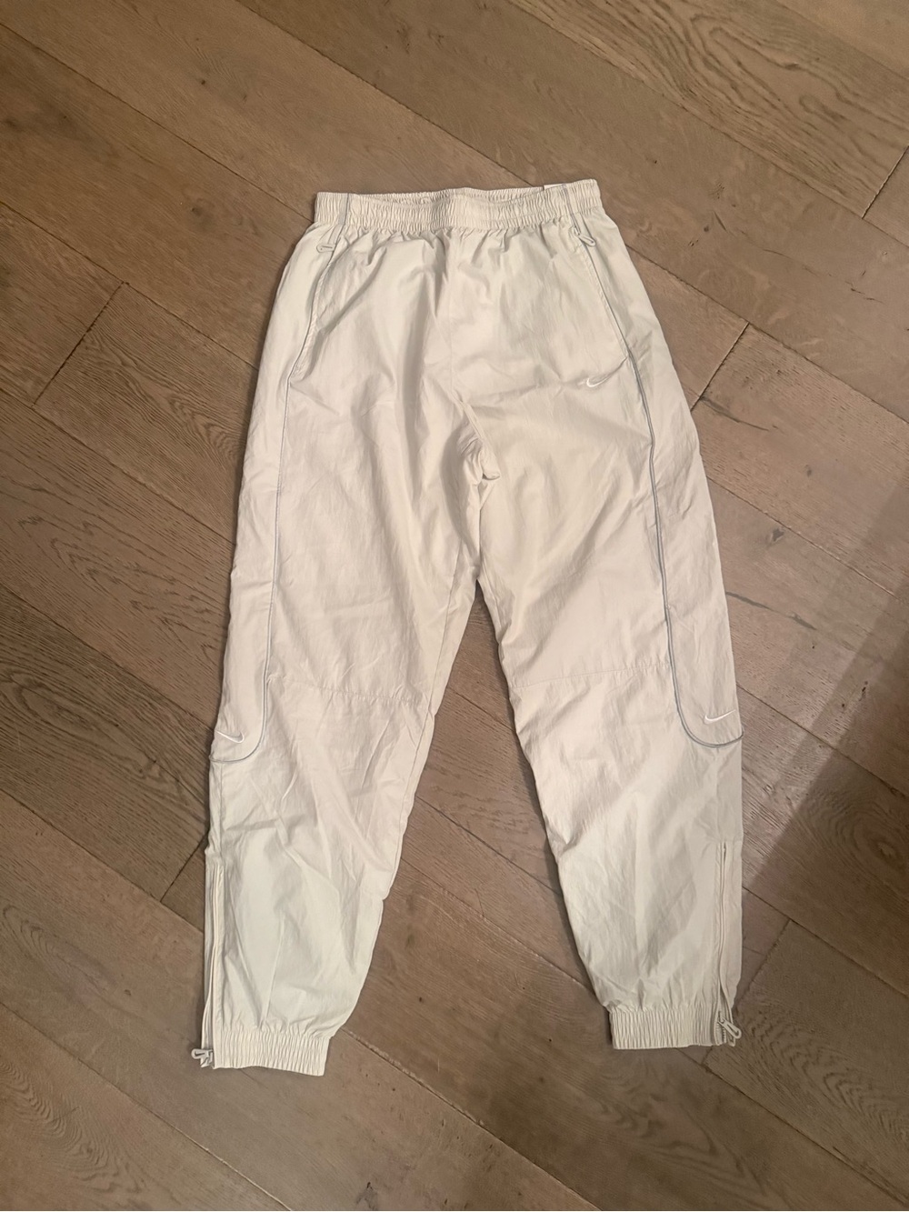 Nike Men's White Track Joggers with Elastic Cuffs